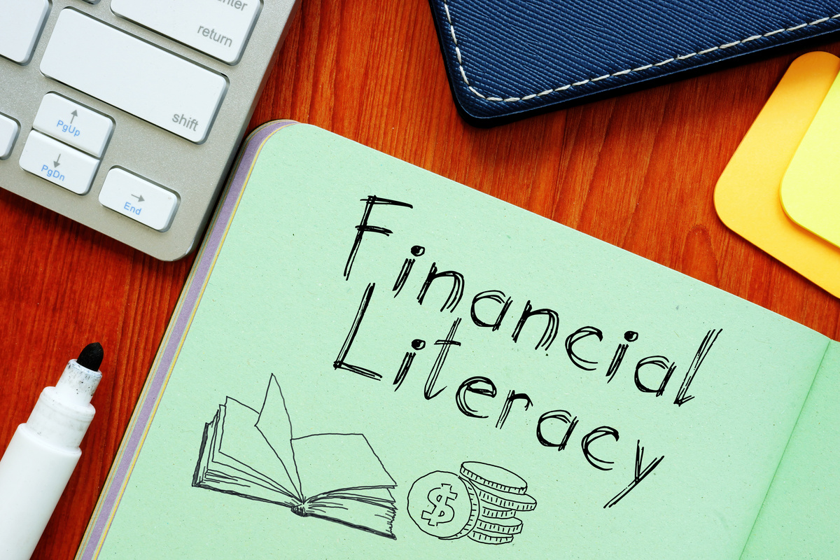 Financial literacy is shown on the business photo using the text